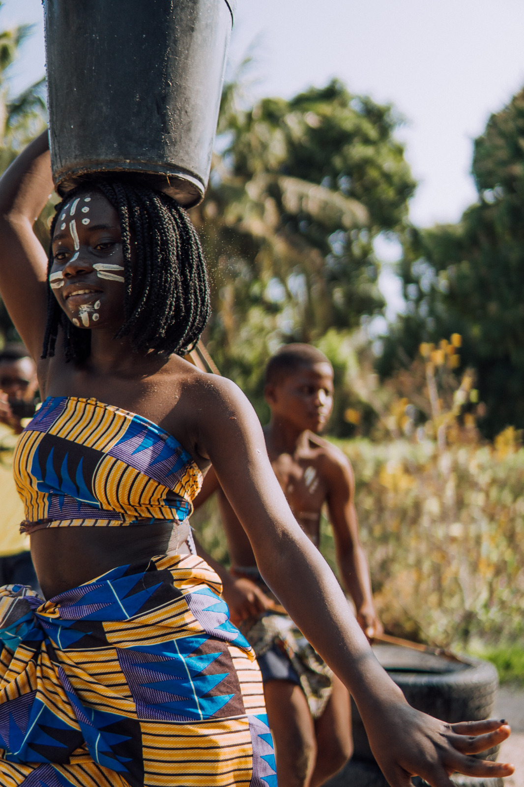 Traditional Mozambican dancer with face paint at the village dance